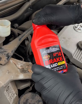 Brake fluid container