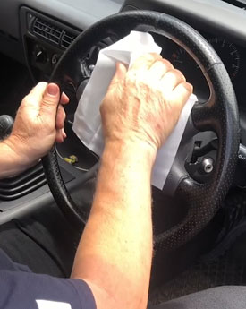 Cleaning a steering wheel with interior wipes