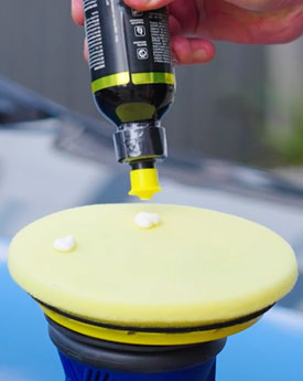 Paint polish being applied to polisher