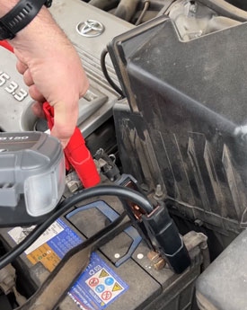 Image of clamping red cable to positive terminal