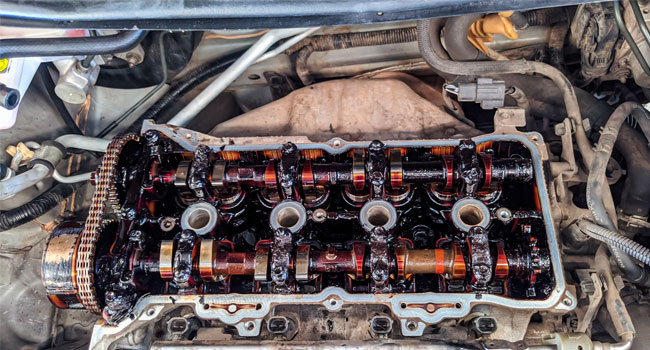 Engine covered in sludge due to lack of oil changes